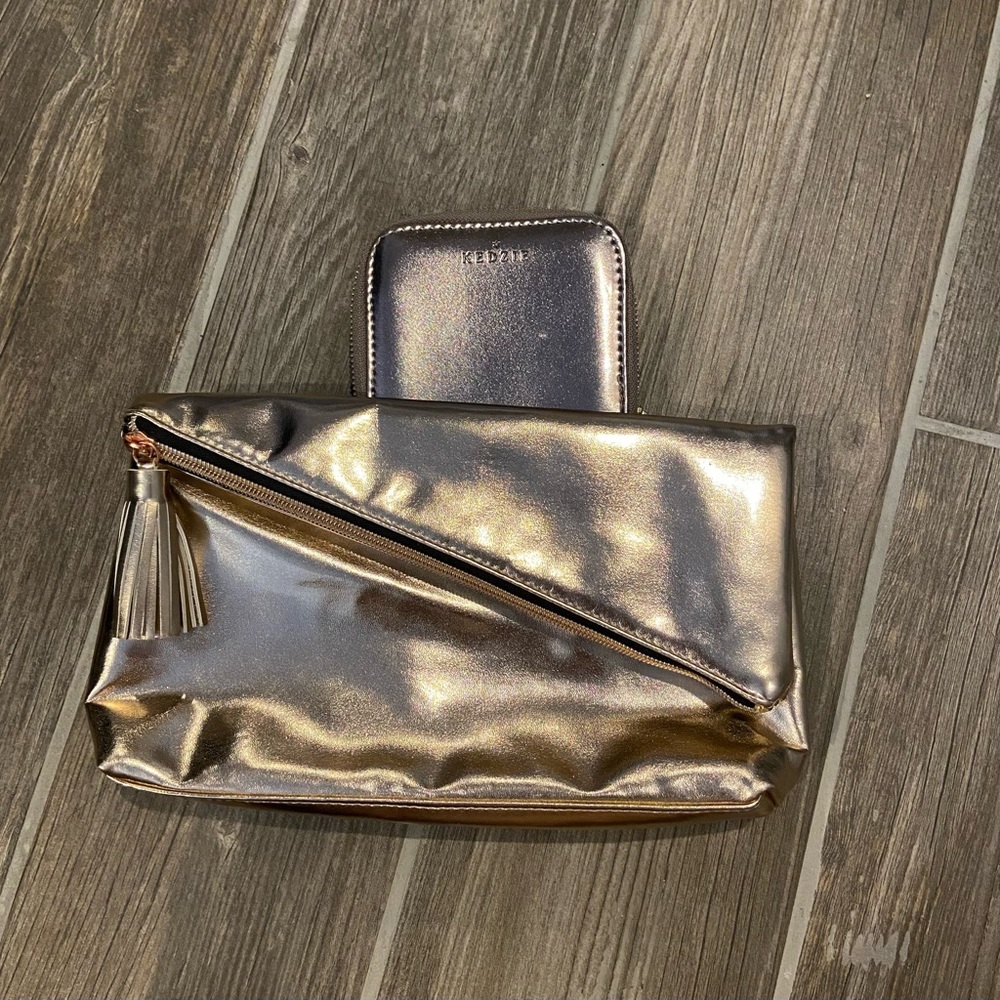 Sleek rose gold clutch and wallet.